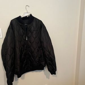 A Sean John 2XL winter polyester and nylon winter coat